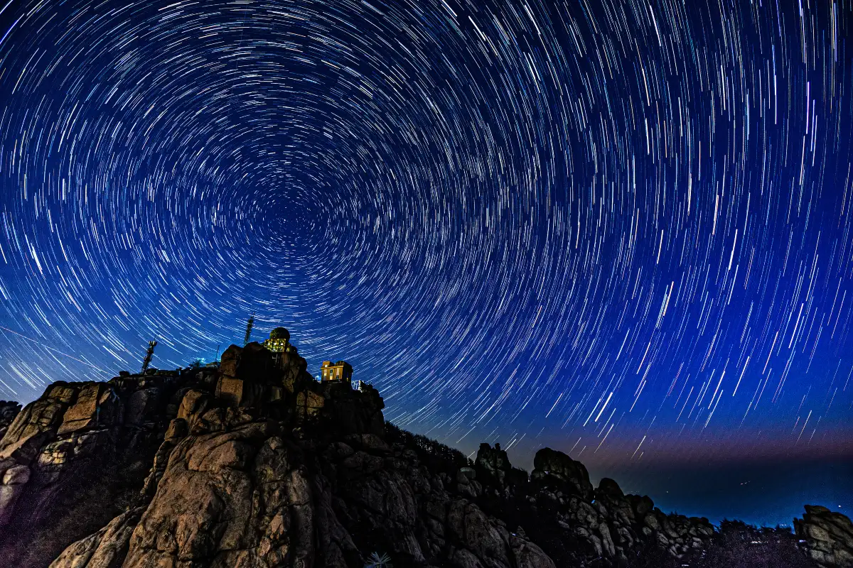 Star trails over the granite crests of Laoshan at night